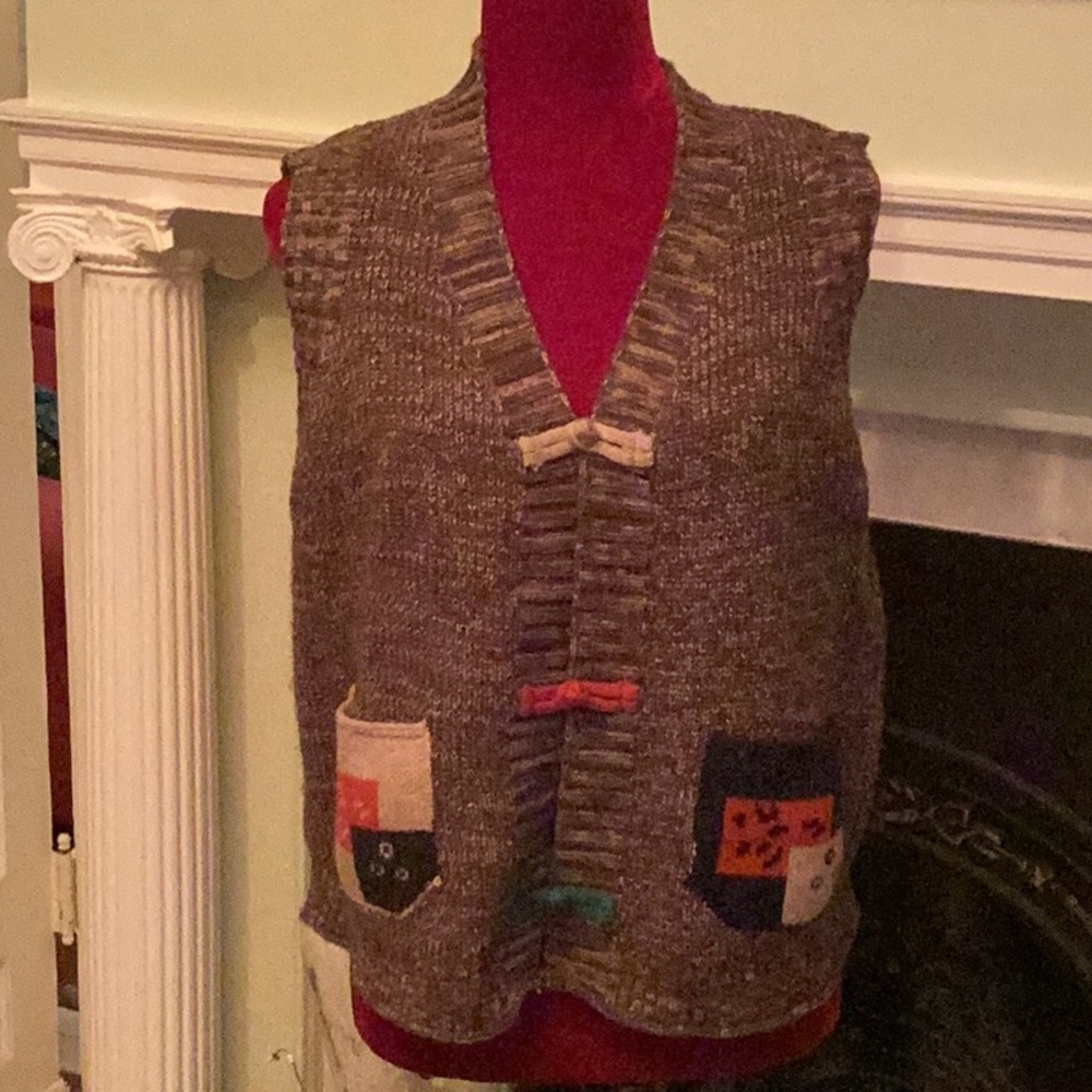 Very cute vest for fall and winter  OS. Would fit M- xl